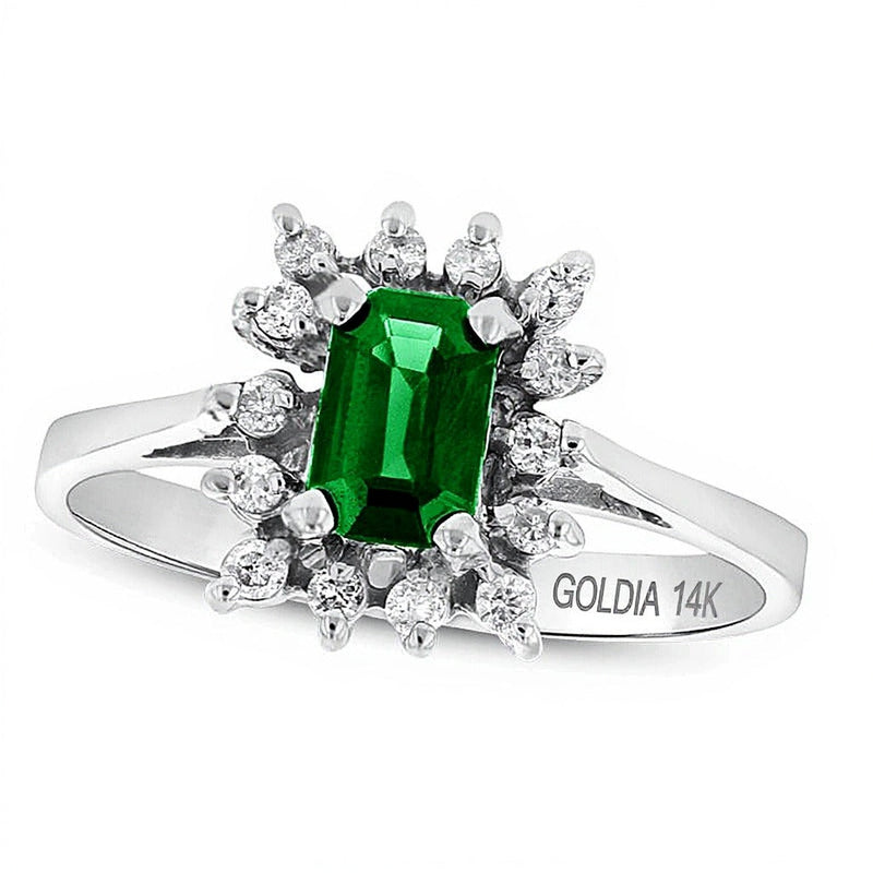 Halo-Ring mit Smaragd im Smaragdschliff und 0,13 ct. Gesamtgewicht Diamanten in 14K Weißgold