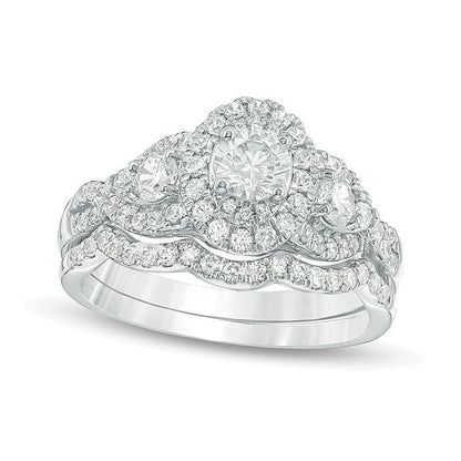 1.17 ct. Gesamtgewicht Diamant Dreistein Braut-Set mit ovalem Halo und gedrehter Schiene in 14K Weißgold
