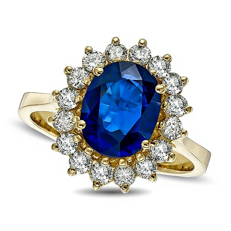 Halo-Ring mit ovalem blauem Saphir und Diamanten 0,63 ct. Gesamtgewicht in 14K Gelbgold