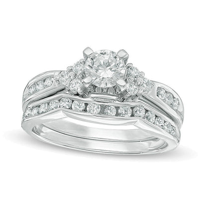 Brautset mit Diamanten 1.0 ct. Gesamtgewicht, rund, dreiseitig, in 10K Weißgold
