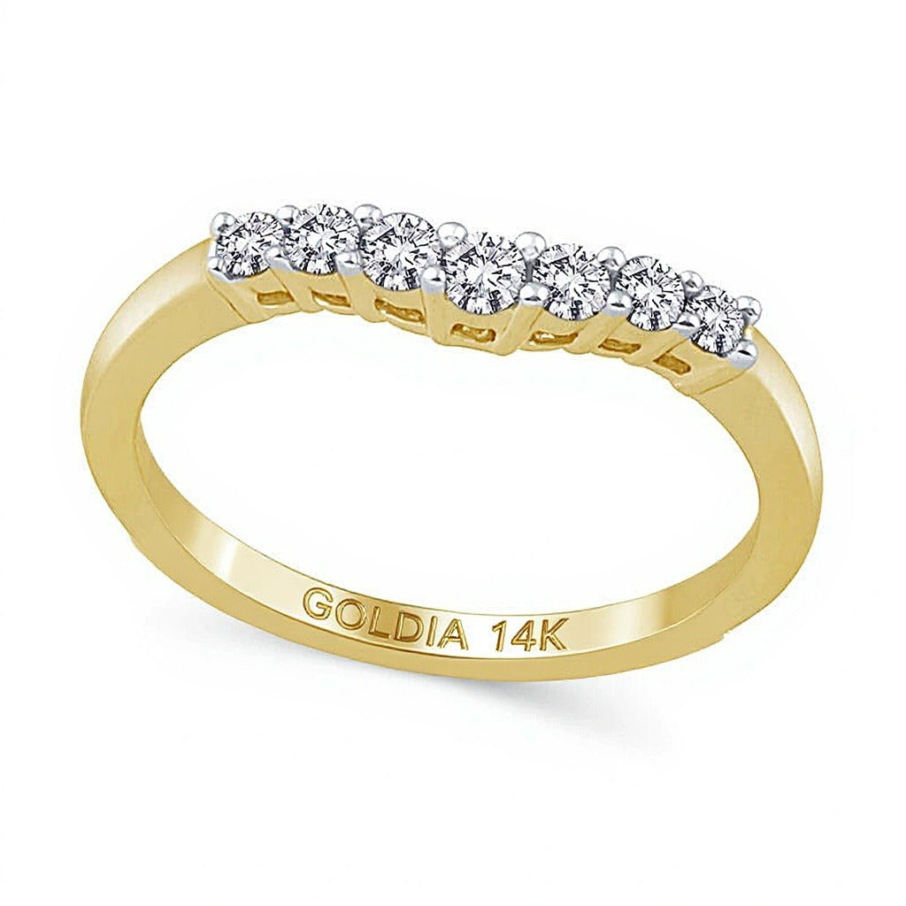 Ehering mit Diamanten 0,25 ct. Gesamtgewicht, sieben Steine, konturiert, in 14K Gelbgold