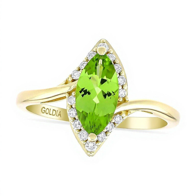 Halo-Ring mit Peridot im Marquise-Schliff und 0,13 ct. Gesamtgewicht Diamanten in 10K Gelbgold