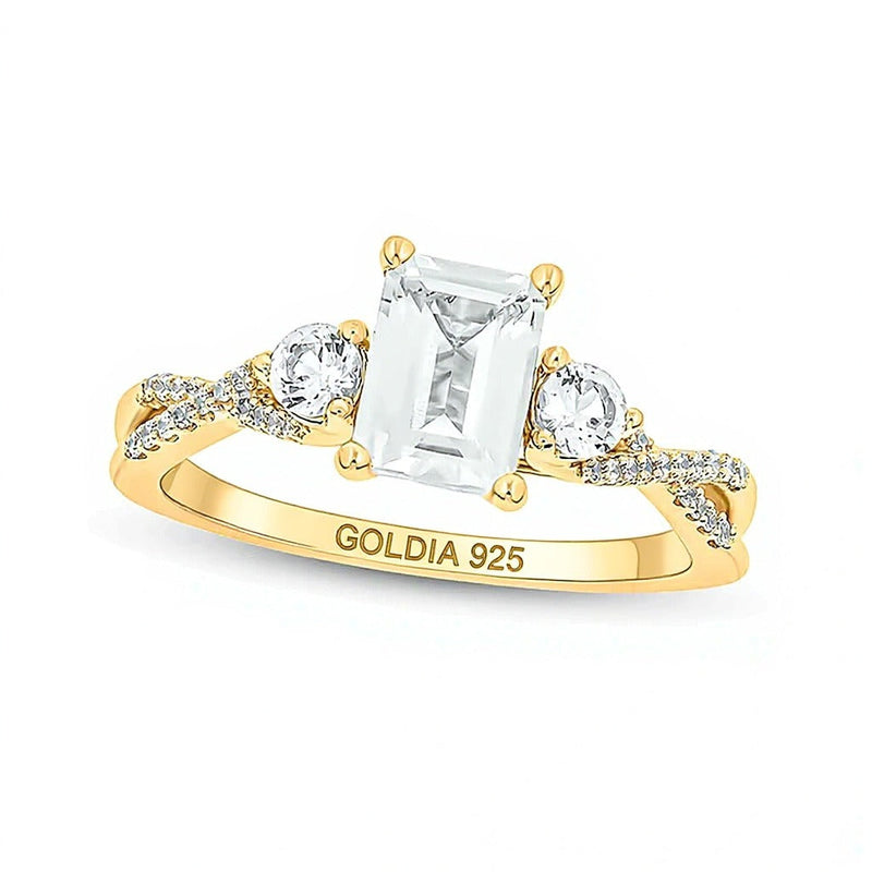 Dreistein-Ring mit weißem Labor-Saphir im Smaragdschliff und 0.1 ct. Gesamtgewicht Diamanten in 14K Weißgold