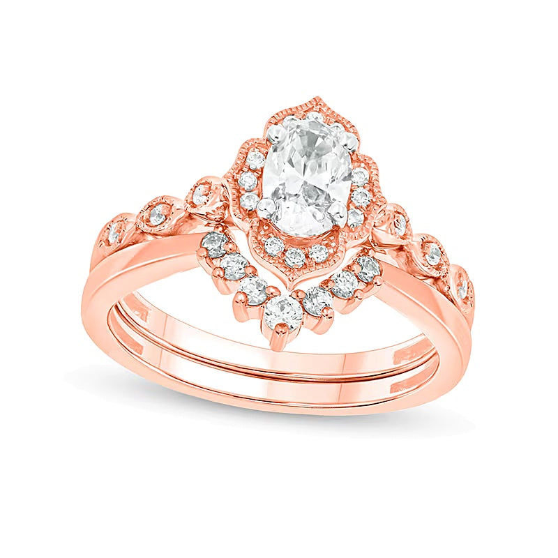 0,75 ct. Gesamtgewicht Diamant-Brautset im Vintage-Stil mit ovalem Diamanten in 14K Roségold (I/I2)