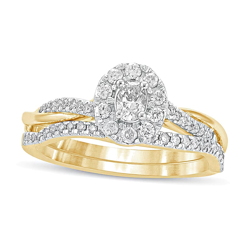 Braut-Set mit ovalem Diamant-Rahmen und gedrehter Schiene, 0,5 ct. Gesamtgewicht, in 10K Gelbgold