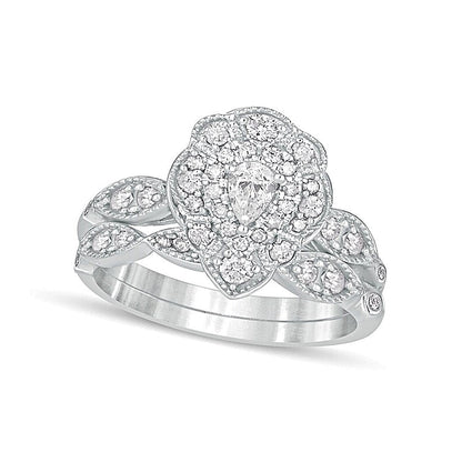 0,63 ct. Gesamtgewicht Diamant-Brautset im Vintage-Stil mit tropfenförmigen und runden Diamanten, doppeltem Blütenrahmen in 10K Weißgold