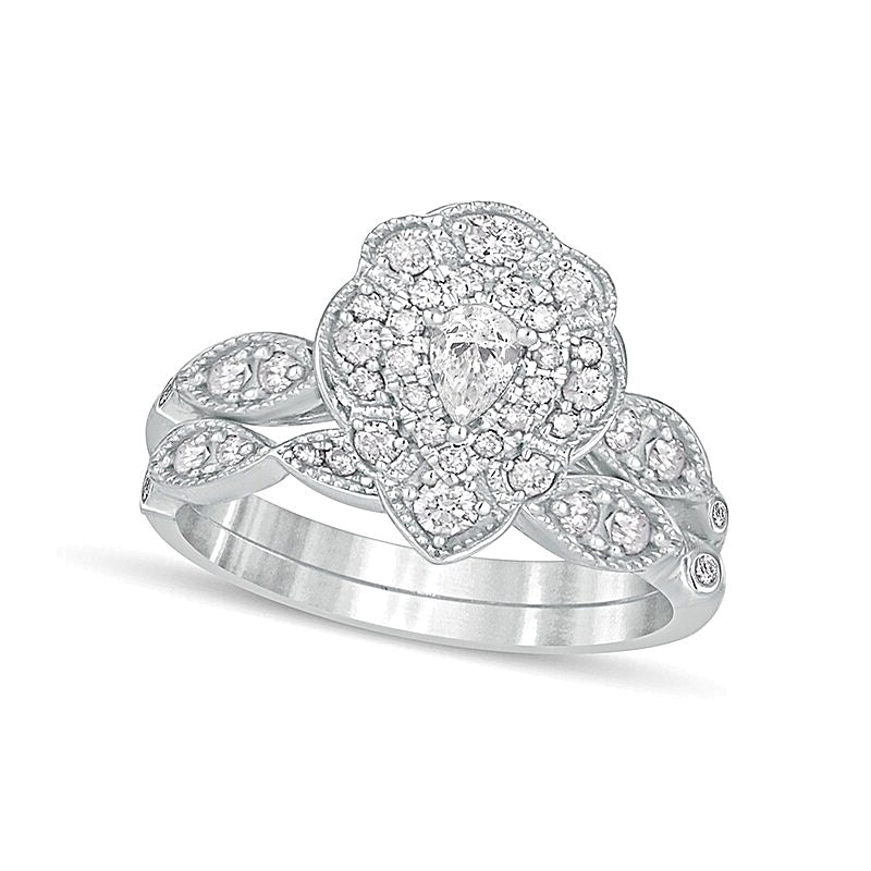 0,63 ct. Gesamtgewicht Diamant-Brautset im Vintage-Stil mit tropfenförmigen und runden Diamanten, doppeltem Blütenrahmen in 10K Weißgold