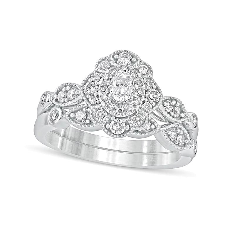 0,63 ct. Gesamtgewicht Diamant-Brautset mit ovalem Mittelstein und Vintage-Doppelblüten-Fassung in 10K Weißgold