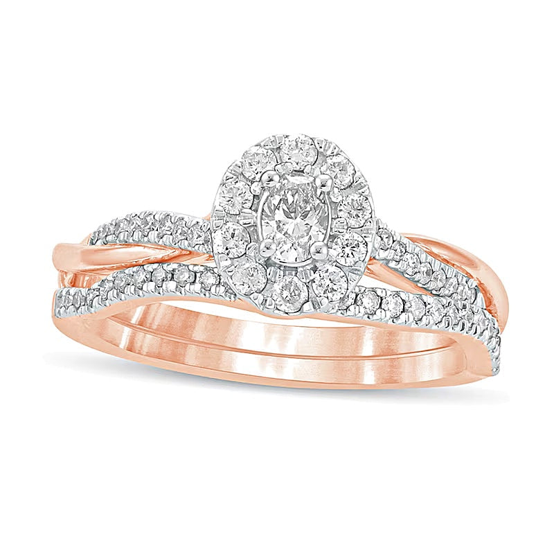 0,5 ct. Gesamtgewicht Braut-Set mit ovalem Diamant, Halo und gedrehter Ringschiene in 10K Roségold