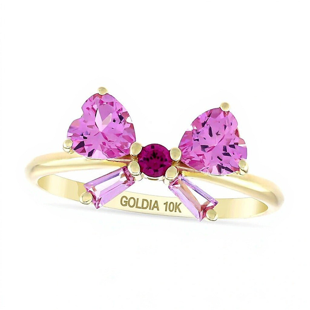 Fashion-Ring in Schleifenform mit Rubin und Saphir in Herz-, Baguette- und Rundschliff aus 10K Gelbgold