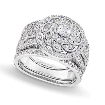 Brautset mit Diamanten 1.5 ct. Gesamtgewicht im keltischen Blumendesign mit Halo aus 10K Weißgold