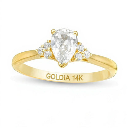 Verlobungsring Solitär mit seitlichem Besatz mit tropfenförmigem und rundem Diamant 0,63 ct. Gesamtgewicht in 14K Gelbgold