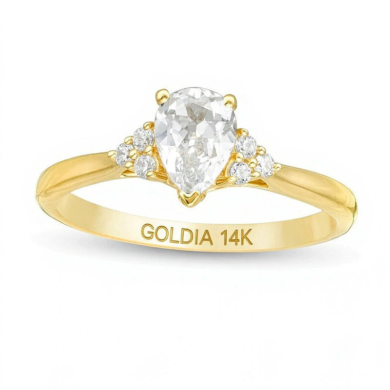 Verlobungsring Solitär mit seitlichem Besatz mit tropfenförmigem und rundem Diamant 0,63 ct. Gesamtgewicht in 14K Gelbgold