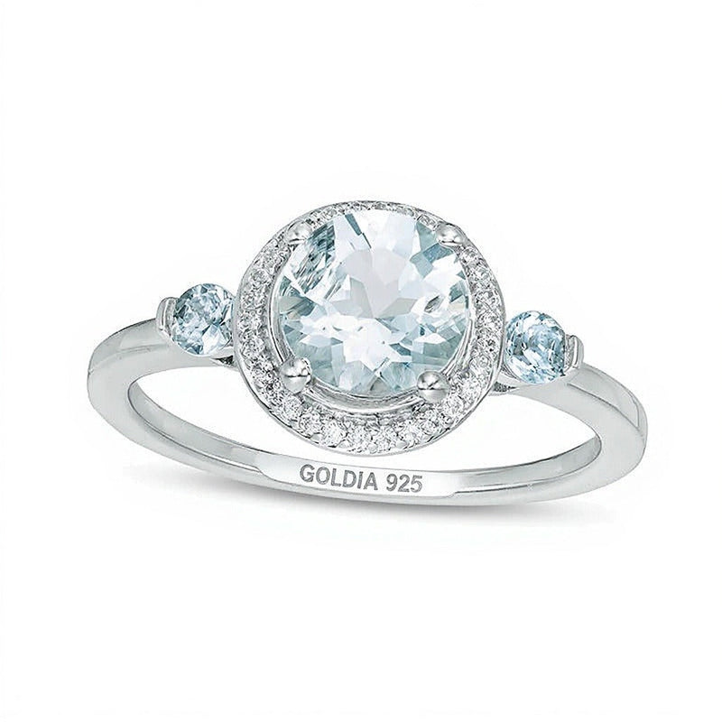 Ring mit Aquamarin und Diamanten 0,17 ct. Gesamtgewicht im Halo aus rhodiniertem Sterlingsilber 925