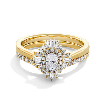 0,75 ct. Gesamtgewicht Brautset mit ovalen Diamanten und doppeltem Sunburst-Rahmen in 14K Gelbgold