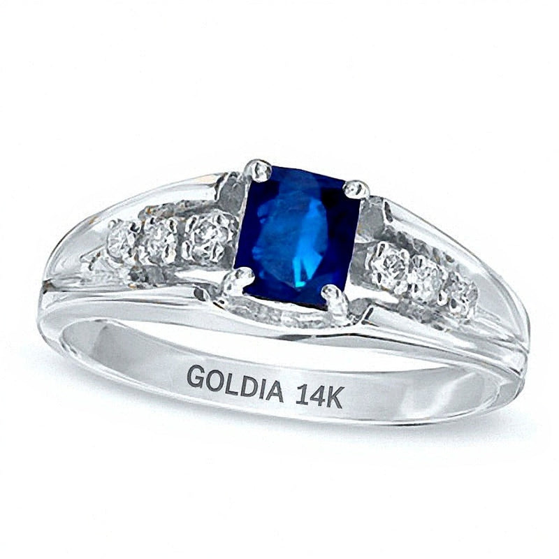 Verlobungsring mit blauem Saphir im Smaragdschliff und Diamantbesatz in 14K Weißgold