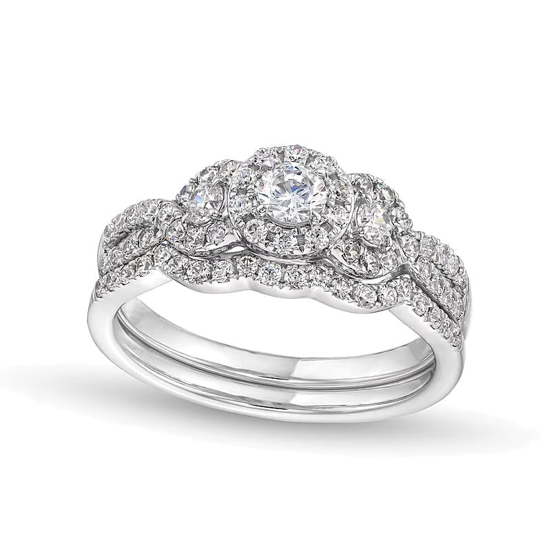 Diamant-Brautset Dreistein Halo 0,88 ct. Gesamtgewicht in 10K Weißgold