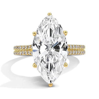 6.5 ct. Gesamtgewicht Solitär mit seitlichem Besatz mit Labordiamanten im Marquise- und Rundschliff in 14K Gelbgold (F/VS2)