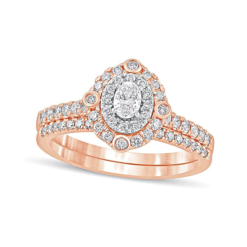 0,63 ct. Gesamtgewicht Braut-Set mit ovalem Diamant und doppeltem Rahmen in 10K Roségold