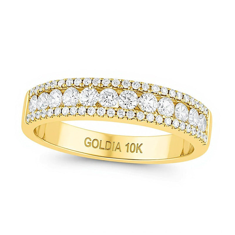 Ring mit Diamanten 0.5 ct. Gesamtgewicht, dreireihig kanalgefasst, in 10K Gelbgold
