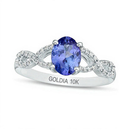 Ring mit ovalem Tansanit und 0,07 ct. Gesamtgewicht Diamanten und gedrehter Ringschiene in 10K Weißgold