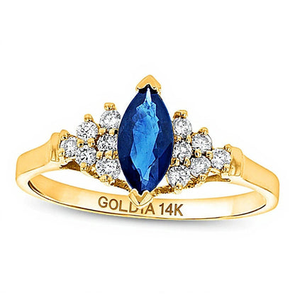 Solitär-Ring mit seitlichem Besatz und Marquise blauem Saphir und 0.2 CT. Gesamtgewicht Diamanten in 14K Gelbgold