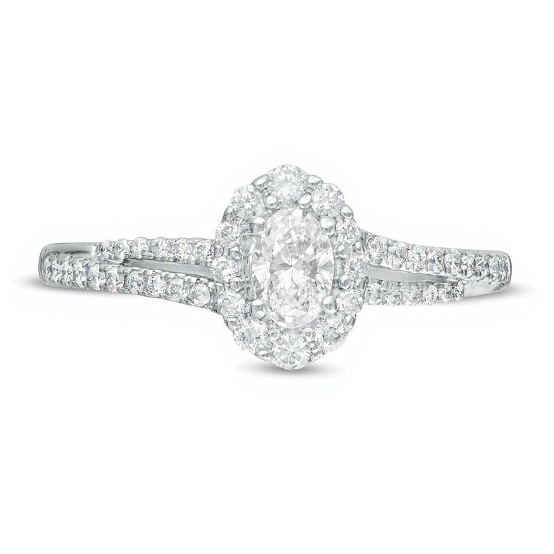 0.5 CT. Gesamtgewicht Verlobungsring mit ovalem Diamant-Halo und geteilter Schiene in 10K Weißgold