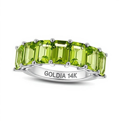 Memoire-Ring mit Peridot im Smaragdschliff in 14K Weißgold