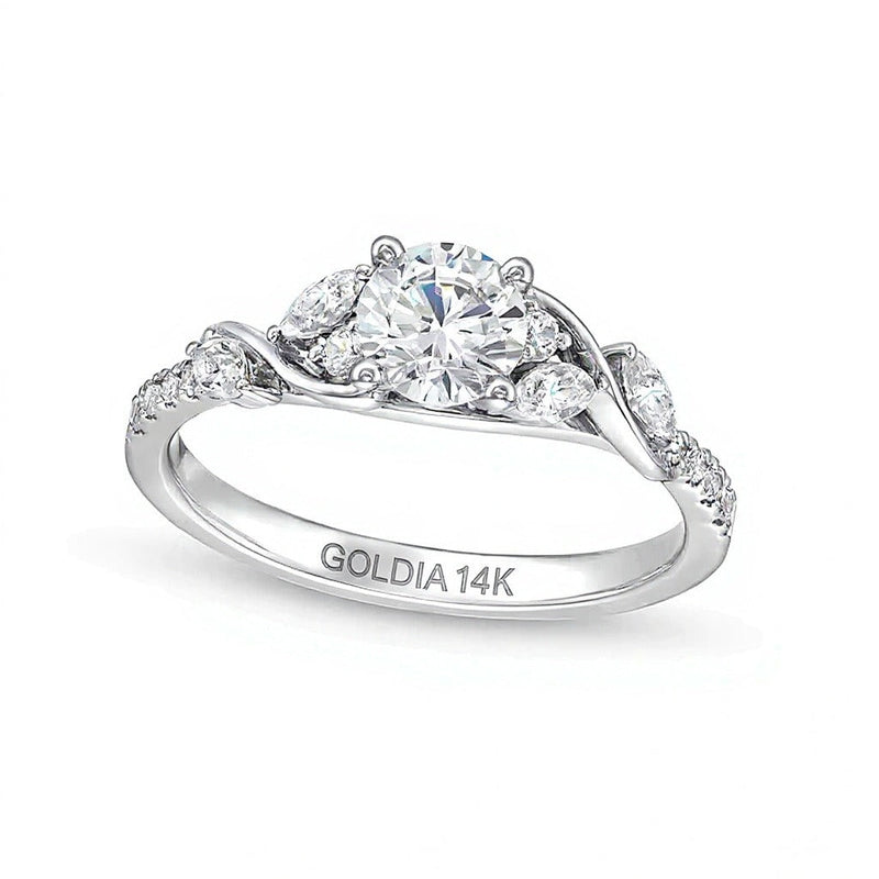 0.88 ct. Gesamtgewicht Diamant Solitär mit seitlichem Besatz in 14K Weißgold (I/I2)