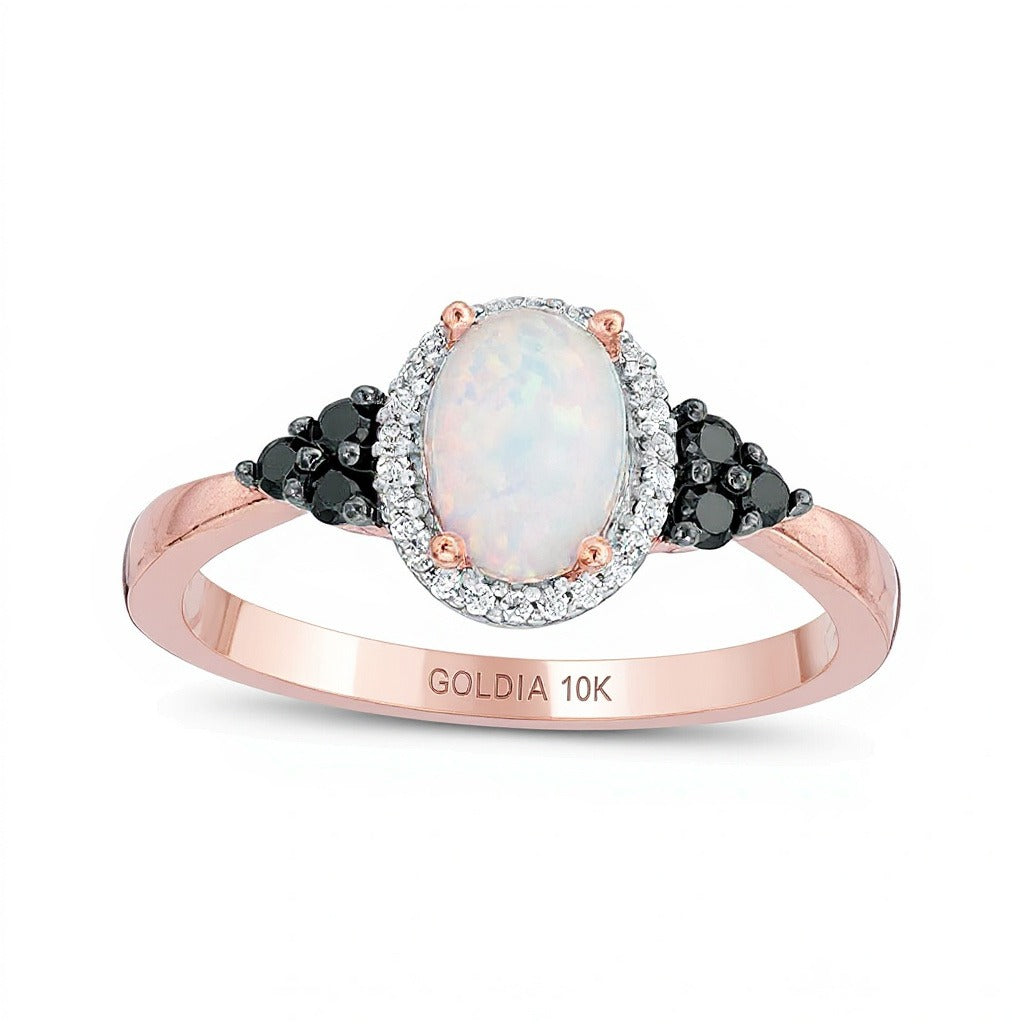 Ring mit ovalem im Labor erzeugtem Opal und behandeltem schwarzem und weißem Diamant 0,17 ct. Gesamtgewicht im Halo in 10K Roségold