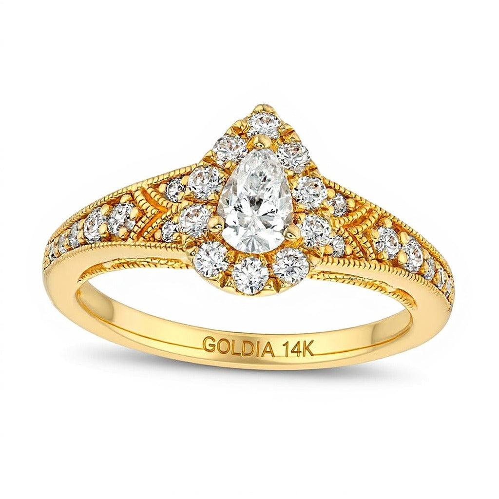 0.75 ct. Gesamtgewicht Verlobungsring im Vintage-Stil mit tropfenförmigem Diamant und Halo aus 14K Gelbgold