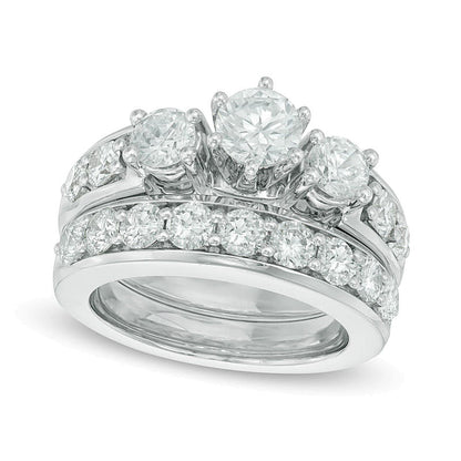 Brautset mit Diamanten 2.75 ct. Gesamtgewicht, rund, in 14K Weißgold
