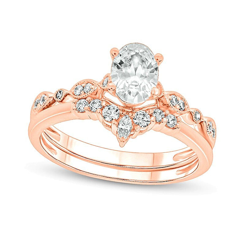 0,75 ct. Gesamtgewicht Brautset mit Diamanten in oval und rund aus 14K Roségold (I/I2)