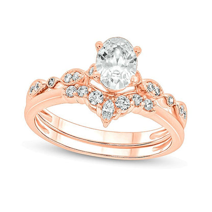 0,75 ct. Gesamtgewicht Brautset mit Diamanten in oval und rund aus 14K Roségold (I/I2)