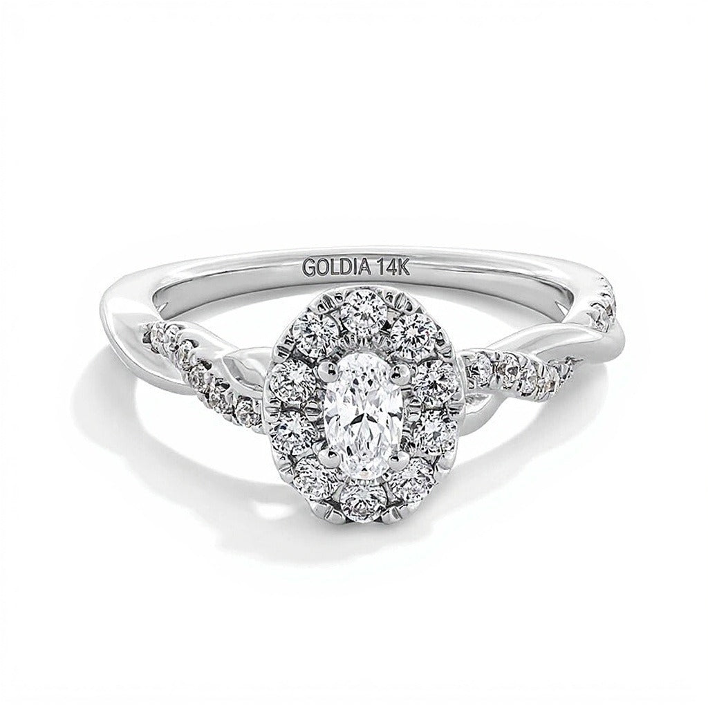 Verlobungsring 0,75 ct. Gesamtgewicht mit ovalem Diamant und Halo, gedrehte Ringschiene, in 14K Weißgold