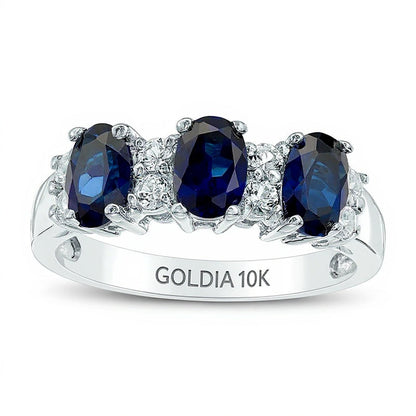 Dreistein-Ring mit ovalem blauem und rundem weißem Saphir (Labor) in 10K Weißgold