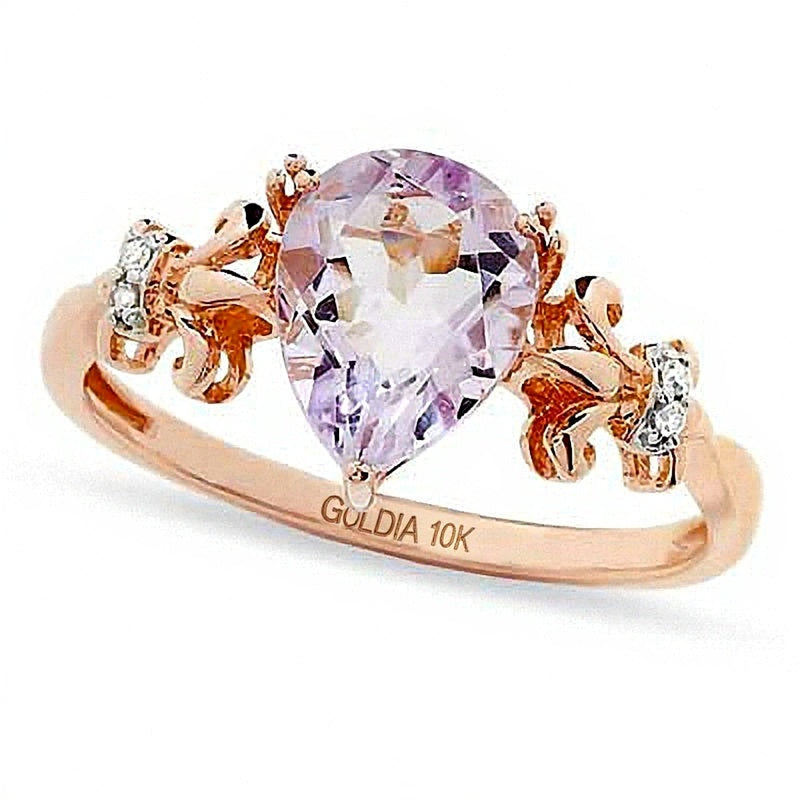 Fashion-Ring mit tropfenförmigem Amethyst und Diamant-Besatz in Lilie-Optik aus 10K Roségold