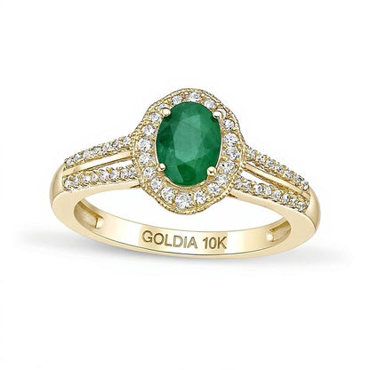 Ring mit ovalem Smaragd und 0,25 ct. Gesamtgewicht Diamanten mit Halo und geteilter Ringschiene in 10K Gelbgold