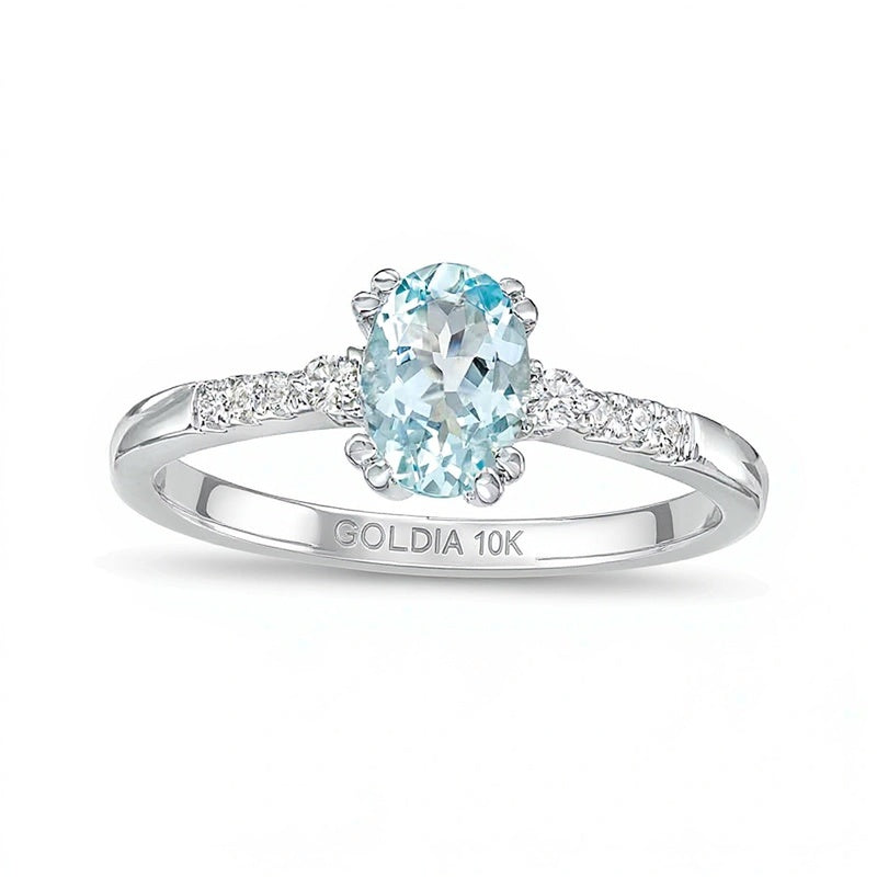 Ring mit ovalem Aquamarin und 0,1 ct. Gesamtgewicht Diamanten in 10K Weißgold