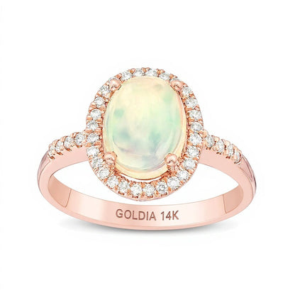 Ring mit ovalem Opal und Diamanten 0,17 ct. Gesamtgewicht in 14K Roségold
