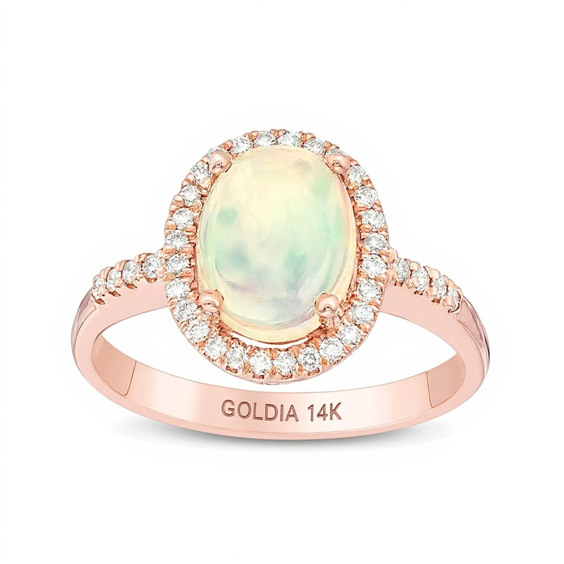 Ring mit ovalem Opal und Diamanten 0,17 ct. Gesamtgewicht in 14K Roségold
