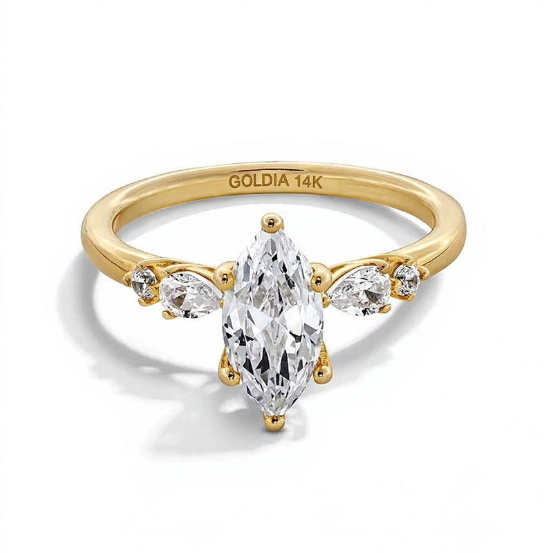 1,25 ct. Gesamtgewicht Solitär mit seitlichem Besatz Verlobungsring mit Labordiamanten in Marquise- und Tropfenform aus 14K Gelbgold (F/VS2)