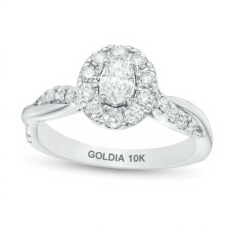 0,88 ct. Gesamtgewicht Verlobungsring mit ovalem Diamant und Halo mit gedrehter Ringschiene in 10K Weißgold