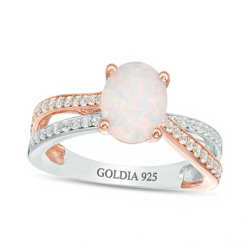 Solitär mit seitlichem Besatz mit ovalem Opal und 0.25 ct. Gesamtgewicht Diamanten in Sterlingsilber