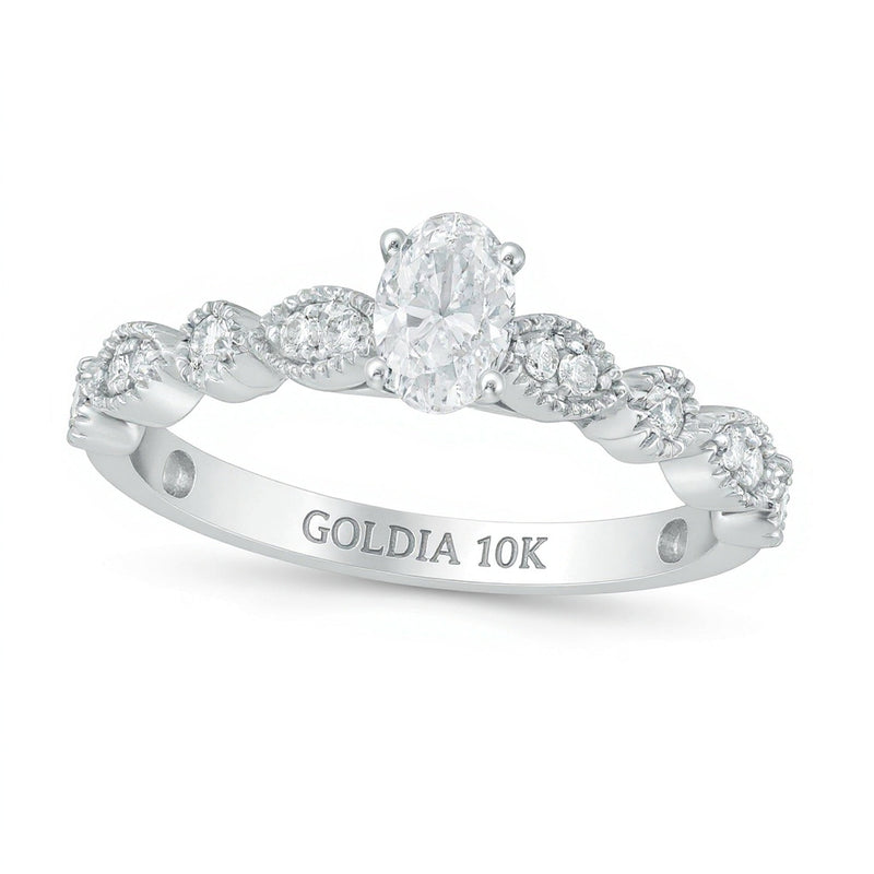 0,5 ct. Gesamtgewicht Solitär mit seitlichem Besatz mit ovalem Diamant und Marquise-Formen im Vintage-Stil in 10K Weißgold
