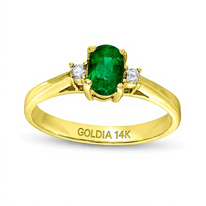 Ring mit ovalem Smaragd und 0,05 ct. Gesamtgewicht Diamanten in 14K Gelbgold