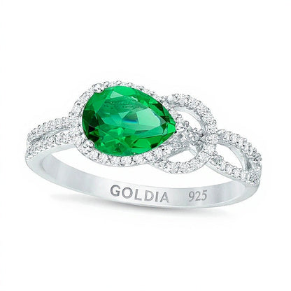 Fashion-Ring mit tropfenförmigem Labor-Smaragd und 0.17 ct. Gesamtgewicht Diamanten und Knoten-Rahmen in rhodiniertem Sterlingsilber