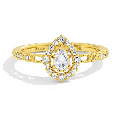 0.5 ct. Gesamtgewicht Halo-Verlobungsring mit tropfenförmigem Diamant in 14K Gelbgold (I/I1)