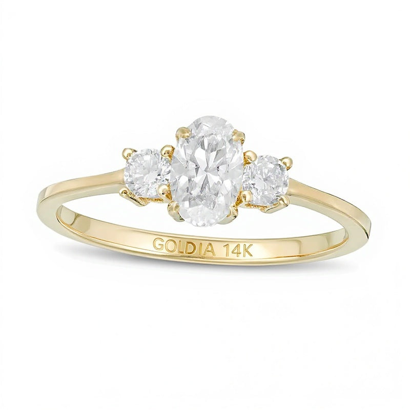 0,63 ct. Gesamtgewicht Dreistein-Verlobungsring mit Diamanten in Oval- und Rundschliff in 14K Gelbgold