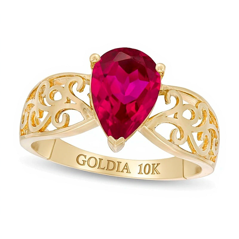 Fashion-Ring mit tropfenförmigem Labor-Rubin in 10K Gelbgold